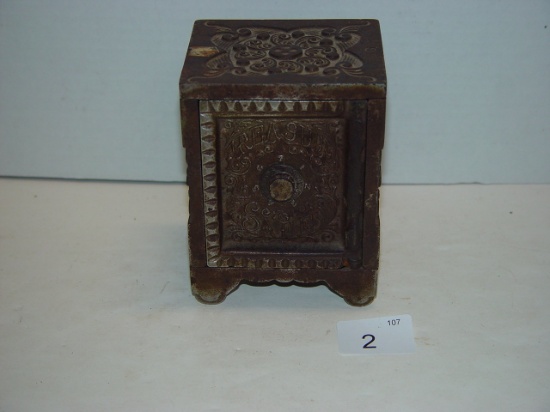 Cast iron combination lock coin bank by The J & E Stevens Co. 5” tall 3 pics
