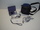 Sony Cybershot digital camera, Memory sticks and gadget bag. Corroded battery area. Untested as-is