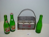 Vintage 7up bottles and tin bottle carrier
