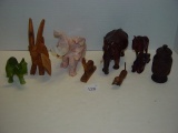 Mixed lot- hand carved figurines and others tallest 6” large wood elephant missing part of tusk