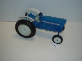 Ertl die-cast Ford tractor 11” long 2 pics