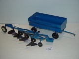 Ertl die cast 4 bottom plow and tin wagon 10” long