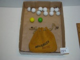 1” marbles with leather pouch marked Manitowish Waters Wis. 2 marbles marked John Deere