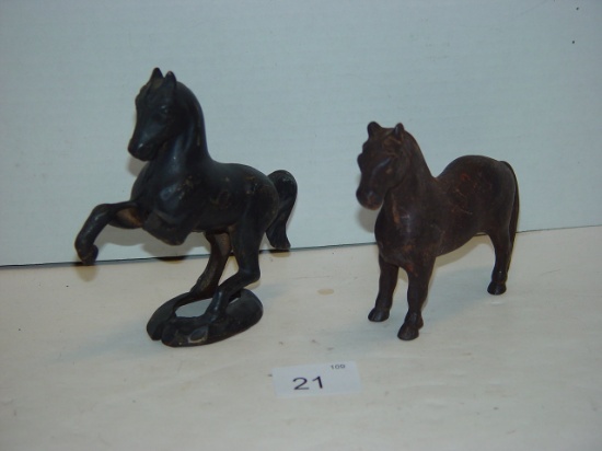 Cast iron horse coin banks. Black Rearing horse has broken leg tallest 5”