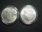 Pair of 1887 AU/Unc. Lightly Cleaned Morgan Dollars
