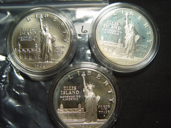 Three 1986 Statue of Liberty Silver Dollars: Two Proof & One BU