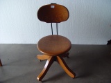 1/4 Sawn Oak Desk Chair on wheels has crack on one leg section