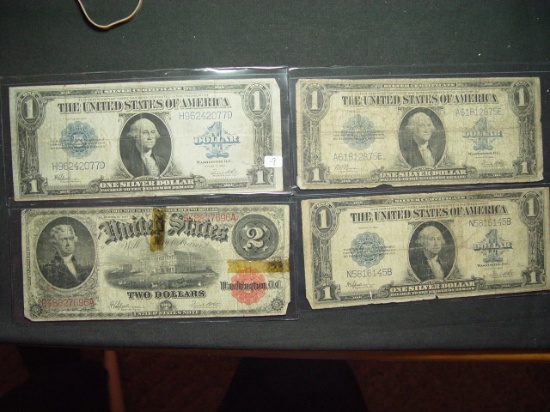 Four Large-sized notes: (3) 1923 $1 Silver Certificates & Torn/Taped $2 Legal Tender Note