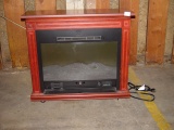 Heat Surge Electric Fireplace w/Instructions on Wheels