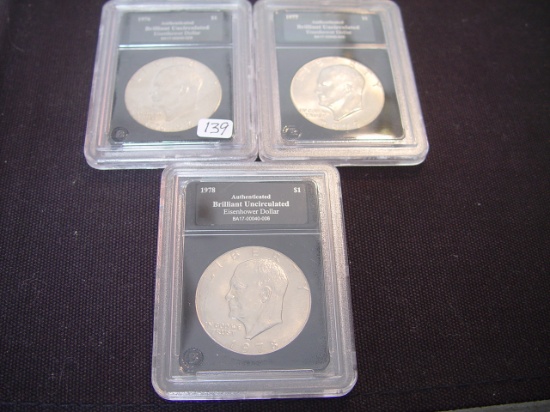 Three Eisenhower $1 1976, 1977-D & 1978