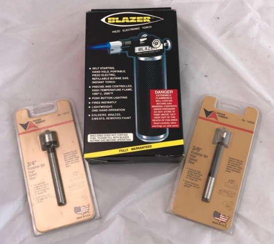 One Blazer Electronic Torch and Two Forstner Bits