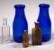 (2) Vintage Cobalt Liberty Milk Bottles with (3) Small Bottles