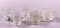 (5) Clear Depression Glass Toothpick Holders, and (1) Salt Cauldron