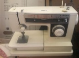 Singer Tabletop Sewing Machine with Large Lot of Sewing Supplies (LPO)
