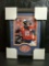 Peyton Mannings mini football cut silver shaprie signed with color photo matted an framed UDA cert