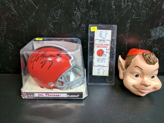 Browns package- signed Joe Thomas mini helmet black sharpy and Brownie elf bank 5inch and ticket fro