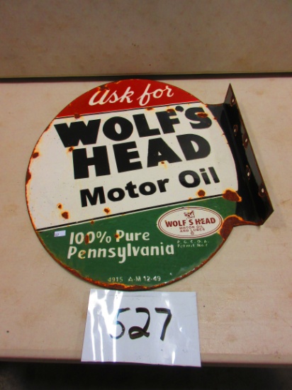 WOLFS HEAD MOTOR OIL FLANGE SIGN D.S.P.OVAL 18''X22'' SOME ROUGH SPOTS GREAT OLD SIGN MARKED A.M.49