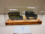 2 CAST IRON TRUCKS IN HOME MADE SHOWCASE