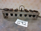 7 PIECE SET SMALL TINNERS ANVILS IN RACK RARE SET