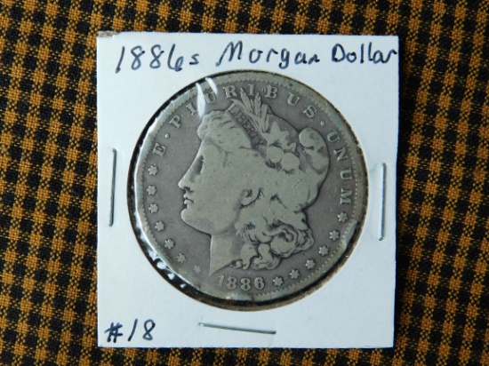 1886S MORGAN DOLLAR (RIM DINGS) VG