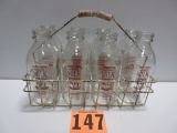 SET OF 8 STATE OF MAIN MILK BOTTLES IN CARRIER ALL MAROON PYRO WITH COW ON BOTTLE