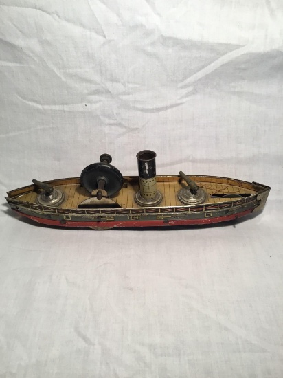 Early tin toy mechanical battleship
