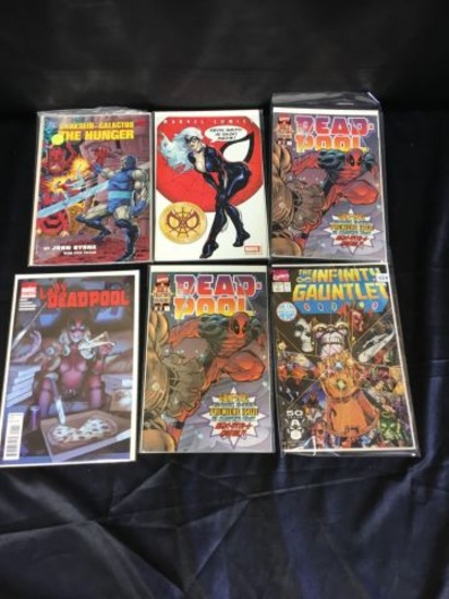 Six comic books including Deadpool and infinity Gauntlet