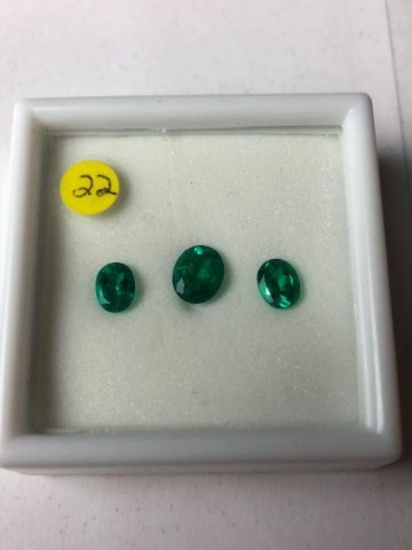 Emerald medium green - larger .77 carat smaller total weight .77 carat