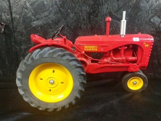 Massey Harris 44 1/8 scale tractor. Signed by Joseph Ertl 6 - 6 - 98