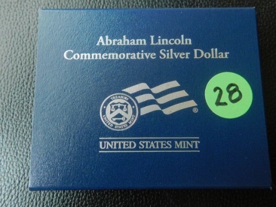 2009 ABRAHAM LINCOLN SILVER DOLLAR IN HOLDER BU