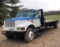 1999 International with 466 diesel engine with new 16 foot flatbed.