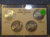 1965 CANADIAN 4-PIECE SILVER DOLLAR SET IN HOLDER