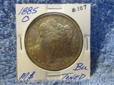 1885O MORGAN DOLLAR BU TONED