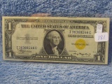 1934A $1. YELLOW SEAL 