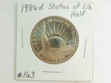 1986D STATUE OF LIBERTY COM. HALF BU