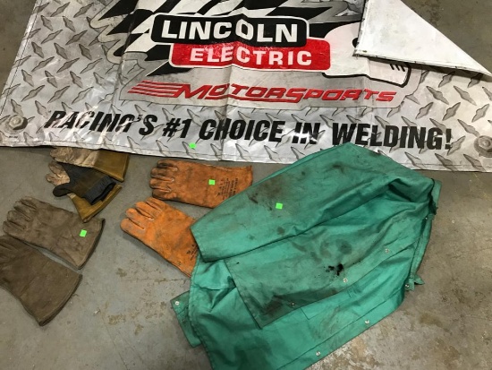 2 Pair used welding gloves, used welding jacket (rough condition) and a Lincoln Electric Banner