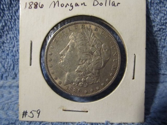 1886 MORGAN DOLLAR AU
