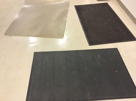1 office chair mat, and 2 walk off mats, one rubber, one carpet