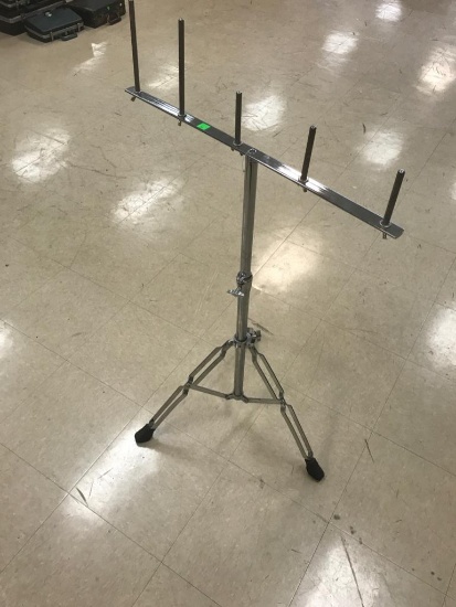 Adjustable cow bell stand