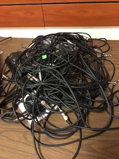 Large pile of mic cords with 1/4 inch ends and various jacks