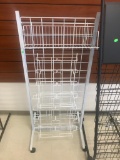 Rolling wire rack display, was used for books and sheet music, approx 4 foot tall