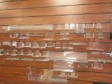 Large collection of plastic slat wall shelves, various sizes