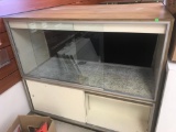 Large Display case, with sliding glass doors, and underneath storage