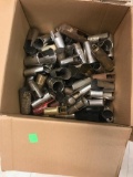 Box of various brass instrument pieces