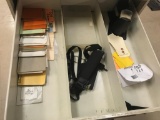 Drawer of misc tags and straps