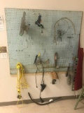 Pegboard with contents, glue guns, light, level and more. You may remove the pegboard too