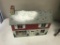Metal tin doll house, with misc contents, approx 18 inches long