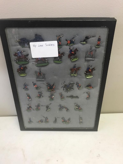 Framed display of various lead toy soldiers