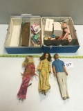 Vintage Barbie and Ken Dolls, clothes have actual buttons. Dolls are from the 60's and Made in Japan