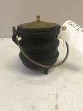 Small cast iron pot with brass lid
